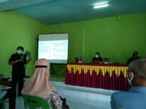 Rapat Koordinasi Perangkat Desa dan Masyarakat Desa Bunyu Barat tentang Intervensi Berbasis Masyarakat (IBM).